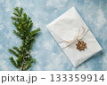 Theres a beautifully decorated Christmas tree with a gift. AI-generated content. 133359914