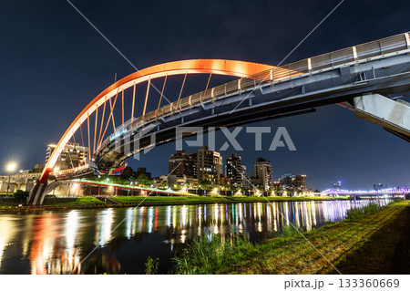 Night view of the Rainbow Bridge in Neihu of Taipei, Taiwan. It lies across the Keelung River. Night view of the Rainbow Bridge in Neihu of Taipei, Taiwan. It lies across the Keelung River. 133360669