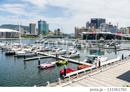 View of Argo Yacht Marina at Glory Pier of Kaohsiung Port, Taiwan, and the Kaohsiung Music Center building. 133361792