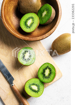 Kiwi fruits in wooden bowl Kiwi fruits in wooden bowl 133362201