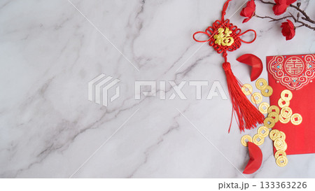 Chinese New Year decorations with gold coins and red envelopes Chinese New Year decorations with gold coins and red envelopes 133363226