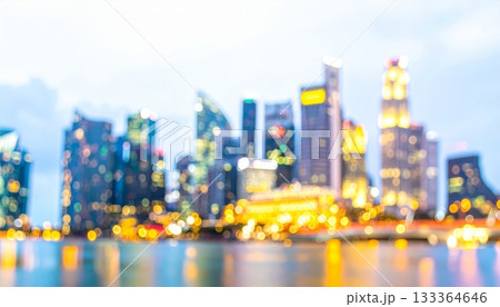 Night cityscape view of a modern urban downtown skyline with illuminated skyscraper buildings and blue sky architecture 133364646
