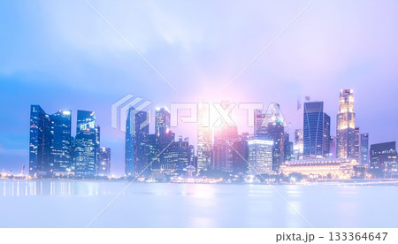 Night cityscape view of a modern urban downtown skyline with illuminated skyscraper buildings and blue sky architecture Night cityscape view of a modern urban downtown skyline with illuminated skyscraper buildings and blue sky architecture 133364647