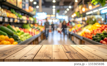Shopping cart in the city street market with people walking past wooden tables of food 133365696