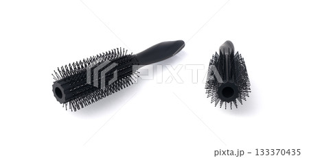 Black round hair styling brush isolated Black round hair styling brush isolated 133370435