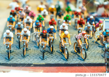 Toy cyclist figurine. 133370477