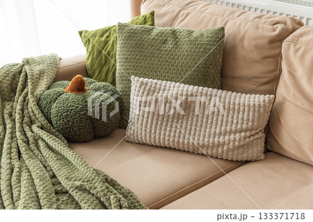 Autumn Living Room with Fabric Pumpkins, Cushions, and Cozy Textiles 133371718