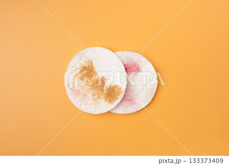 Dirty Cotton Pads, Makeup Removal, Used Cotton Disks after Makeup Cleansing, Removing Make Up Dirty Cotton Pads, Makeup Removal, Used Cotton Disks after Makeup Cleansing, Removing Make Up 133373409
