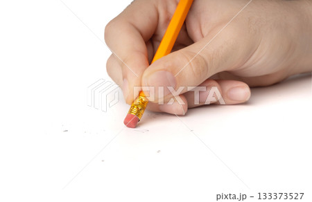Eraser on paper. Erasing what was written, deleting an error, correcting mistake 133373527