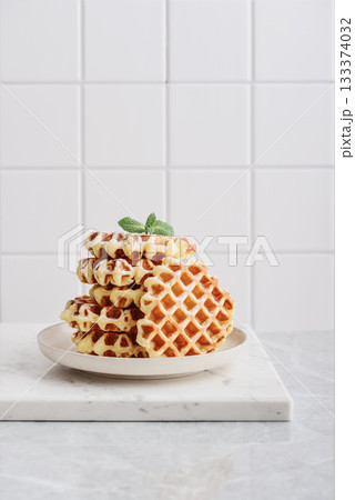 Stack of fresh homemade waffles 133374032