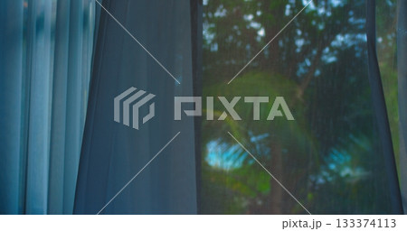 morning ambiance with reflections, serene scenery featuring reflective glass and bloom effects 133374113