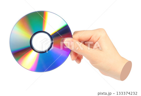 Hand holds cd compact disk, isolated on transparent background, retro teachnology concept. Contemporary art design Hand holds cd compact disk, isolated on transparent background, retro teachnology concept. Contemporary art design 133374232