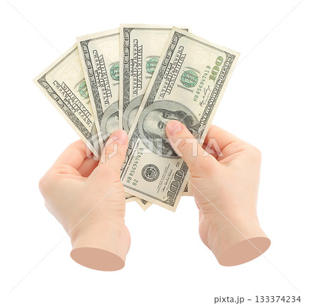 Hand holds US dollars cash bills, isolated on transparent background, business concept. Contemporary art design Hand holds US dollars cash bills, isolated on transparent background, business concept. Contemporary art design 133374234