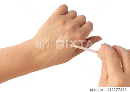 Foundation cream smear isolated. Cosmetic concealer textured swatch, skin tone cream Foundation cream smear isolated. Cosmetic concealer textured swatch, skin tone cream 133377833