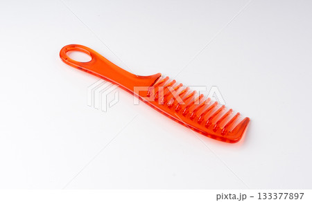 Orange plastic comb. New color hairbrush Orange plastic comb. New color hairbrush 133377897