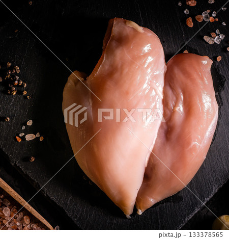 raw chicken fillet on stone background with copy space for your text raw chicken fillet on stone background with copy space for your text 133378565