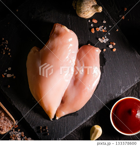raw chicken fillet on stone background with copy space for your text raw chicken fillet on stone background with copy space for your text 133378600