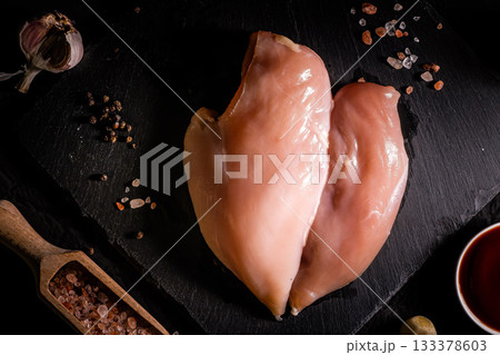 raw chicken fillet on stone background with copy space for your text 133378603