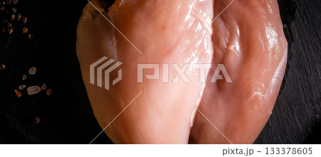 raw chicken fillet on stone background with copy space for your text 133378605