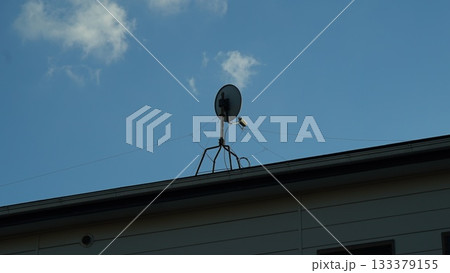 Antenna installed on the roof of a Japanese building 133379155