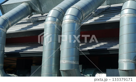 exhaust pipes outside the building 133379171