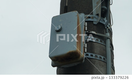 Rusty Electric pole switchboard on a Japanese street Rusty Electric pole switchboard on a Japanese street 133379226