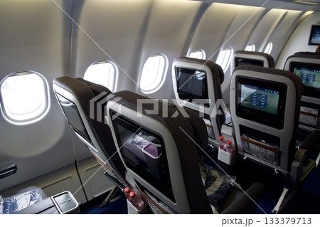 Frankfurt, Germany, June 10, 2019: Passenger View of Inflight Entertainment Screen in Lufthansa Premium Economy Frankfurt, Germany, June 10, 2019: Passenger View of Inflight Entertainment Screen in Lufthansa Premium Economy 133379713