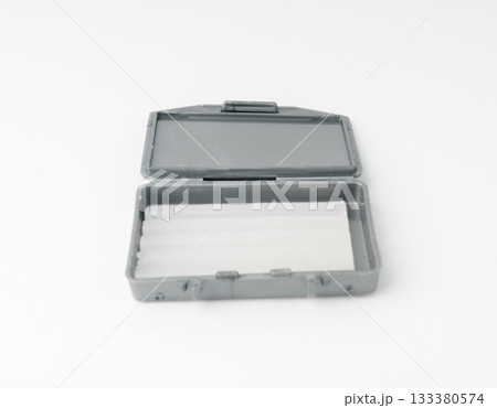 Orthodontic wax box. Brackets care technology, mouth protection, dentist wax Orthodontic wax box. Brackets care technology, mouth protection, dentist wax 133380574