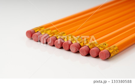 Pencils with a rubber isolated. Unsharpened yellow wooden graphite pencils Pencils with a rubber isolated. Unsharpened yellow wooden graphite pencils 133380588