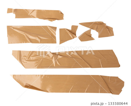 Brown scotch tape set, adhesive tape pieces isolated Brown scotch tape set, adhesive tape pieces isolated 133380644