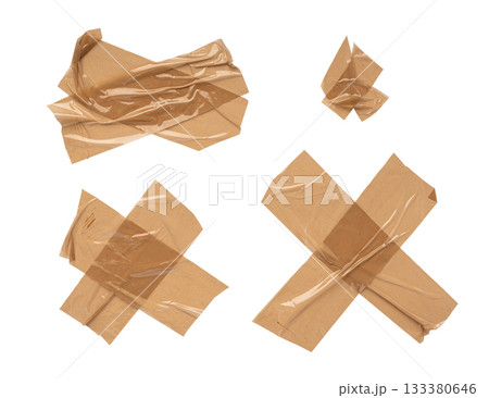 Brown scotch tape set, adhesive tape pieces isolated Brown scotch tape set, adhesive tape pieces isolated 133380646