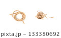 Twine rope piece isolated, jute loop fragment, beige packaging cord knots, old natural line cable 133380692