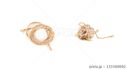Twine rope piece isolated, jute loop fragment, beige packaging cord knots, old natural line cable 133380692