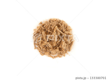 String piece isolated, jute rope fragment, part of packaging cord knots, eco-friendly natural rope 133380701