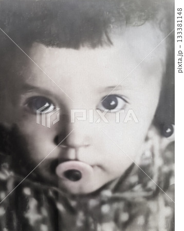A vintage portrait of a little girl with a pacifier in her mouth. Retro photo from 1967. 133381148