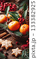 Christmas Scene with Mandarins and Cookies on the table with Christmas Decorations 133382925