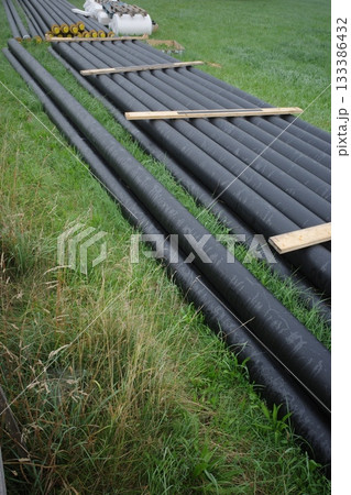 Industrial Pipes on Green Grass Industrial Pipes on Green Grass 133386432