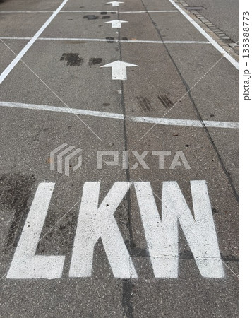 LKW Road Marking with Arrows on Asphalt LKW Road Marking with Arrows on Asphalt 133388773