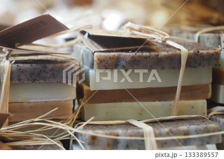Handmade soap collection on display in a market Handmade soap collection on display in a market 133389557