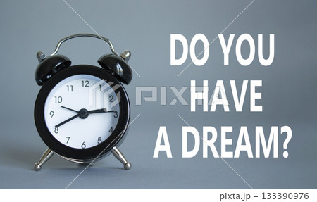 Do you have a Dream symbol. Beautiful grey background with alarm clock. Business and Do you have a Dream concept. Copy space. 133390976