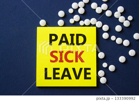 Paid Sick Leave symbol. Concept words Paid Sick Leave on yellow note. Beautiful deep blue background with pills. Healthcare and Paid Sick Leave concept. Copy space. 133390992