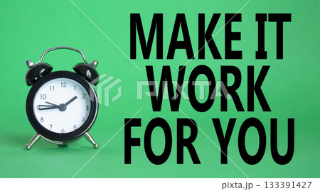 Make it work for you symbol. Beautiful green background with alarm clock. Business and Make it work for you concept. Copy space. Make it work for you symbol. Beautiful green background with alarm clock. Business and Make it work for you concept. Copy space. 133391427
