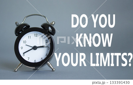 Do You Know Your Limits symbol. Beautiful grey background with alarm clock. Business and Do You Know Your Limits concept. Copy space. Do You Know Your Limits symbol. Beautiful grey background with alarm clock. Business and Do You Know Your Limits concept. Copy space. 133391430