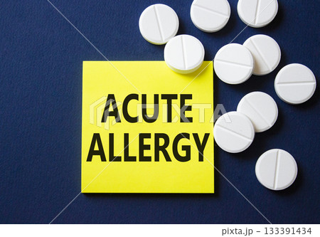 Acute Allergy symbol. Concept word Acute Allergy on yellow note. Beautiful deep blue background with pills. Medicine and Acute Allergy concept. Copy space 133391434