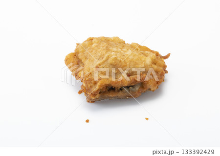 Fried chicken breast in isolated white background Fried chicken breast in isolated white background 133392429