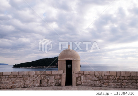 Defense walls of the old town of Dubrovnik, a well-preserved medieval fortress and a popular tourist destination, Croatia 133394310