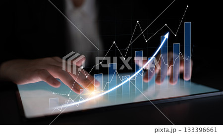 Modern Businessman Using Digital Tablet to Analyze Stock Market Trends with Graphs and Charts on Screen for Financial Insights Scalp Modern Businessman Using Digital Tablet to Analyze Stock Market Trends with Graphs and Charts on Screen for Financial Insights Scalp 133396661