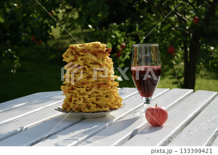 Golden brown Sakotis, a traditional Lithuanian tree cake, Golden brown Sakotis, a traditional Lithuanian tree cake, 133399421
