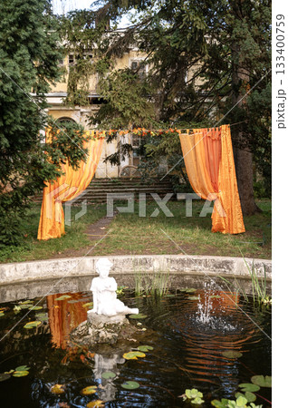 fountain in the form of an angel sitting in water, 19th century. 133400759