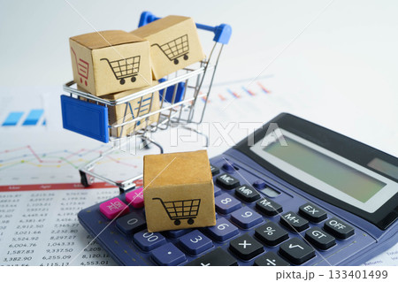 Online shopping, Shopping cart box on calculator, import export, finance commerce. 133401499